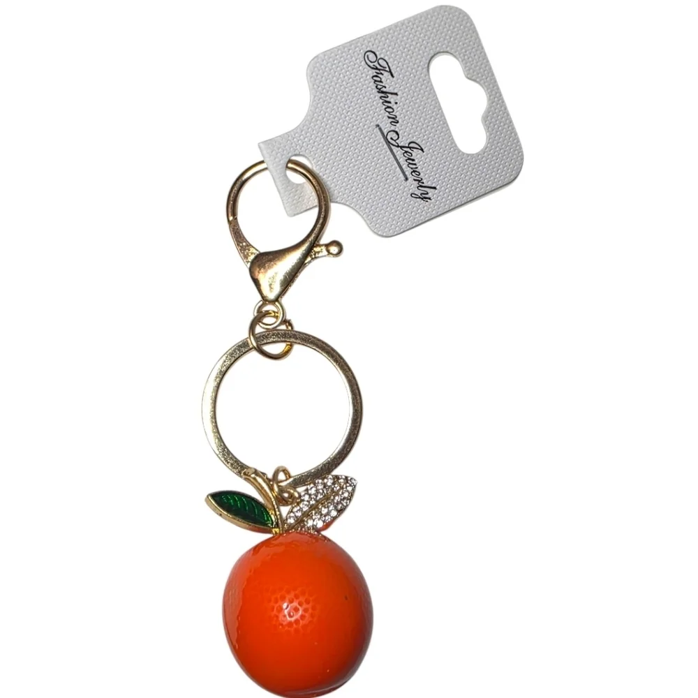 Orange Shaped Purse Charm with Rhinestone Detail And Gold Hardware